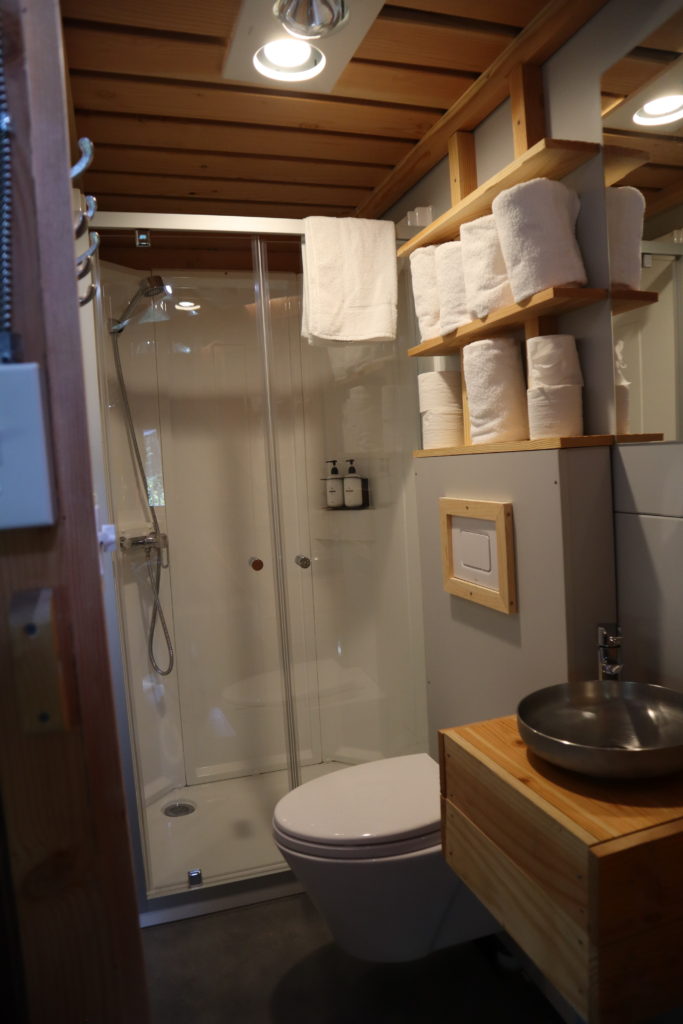 The Bathroom With Shower in The Trappeur Tent at Huttopia Adirondacks 